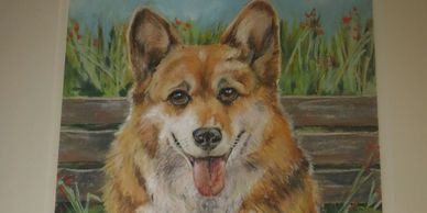 A painting of a dog with his tongue hanging out.