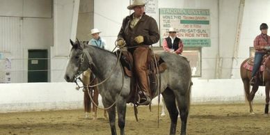 A man riding on the back of a horse.